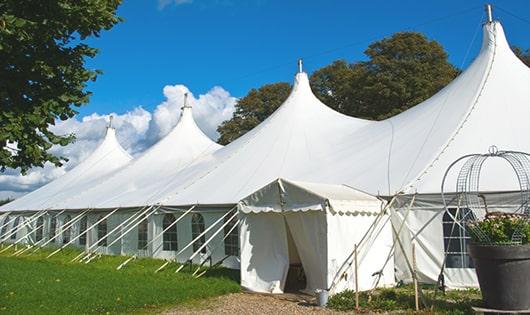 high-quality portable toilets stationed at a wedding, meeting the needs of guests throughout the outdoor reception in Orion